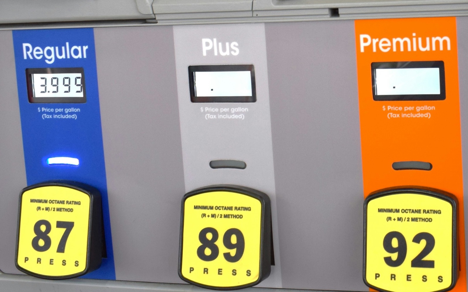 Fuel pump grade panels labelled Regular, Plus and Premium, with only the Regular price-per-gallon display lit